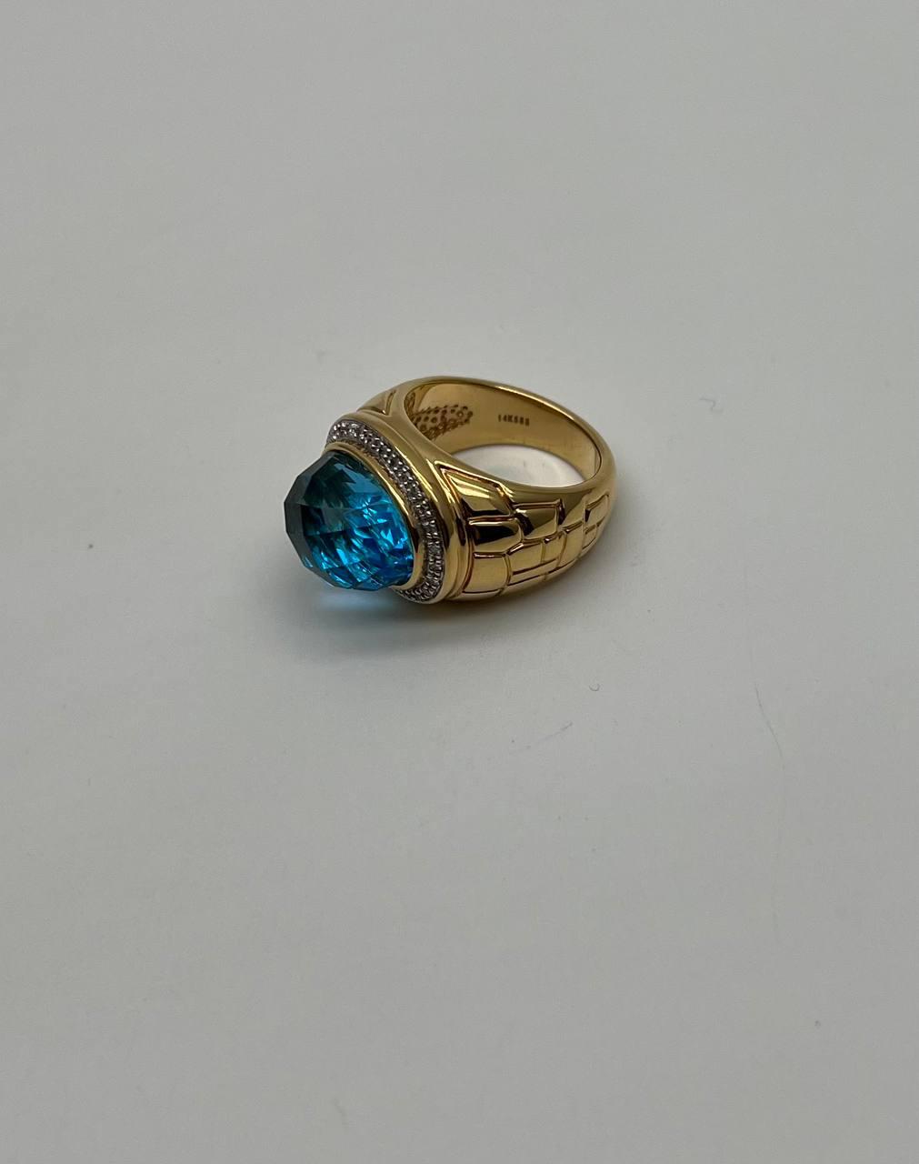 Large Oval Shape Swiss Blue Topaz 14K Horizontal Yellow Gold Dome Cocktail Ring