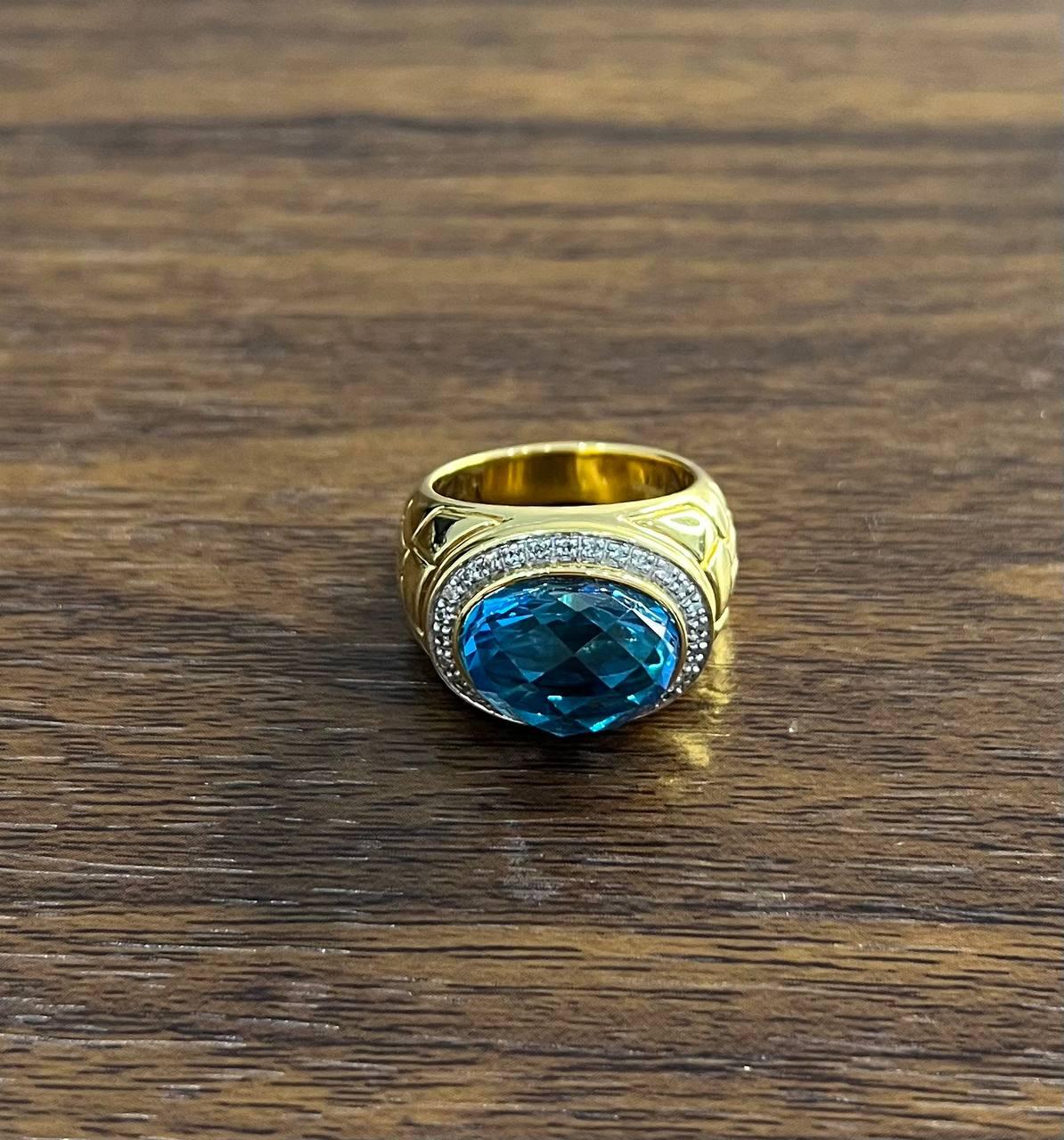 Large Oval Shape Swiss Blue Topaz 14K Horizontal Yellow Gold Dome Cocktail Ring