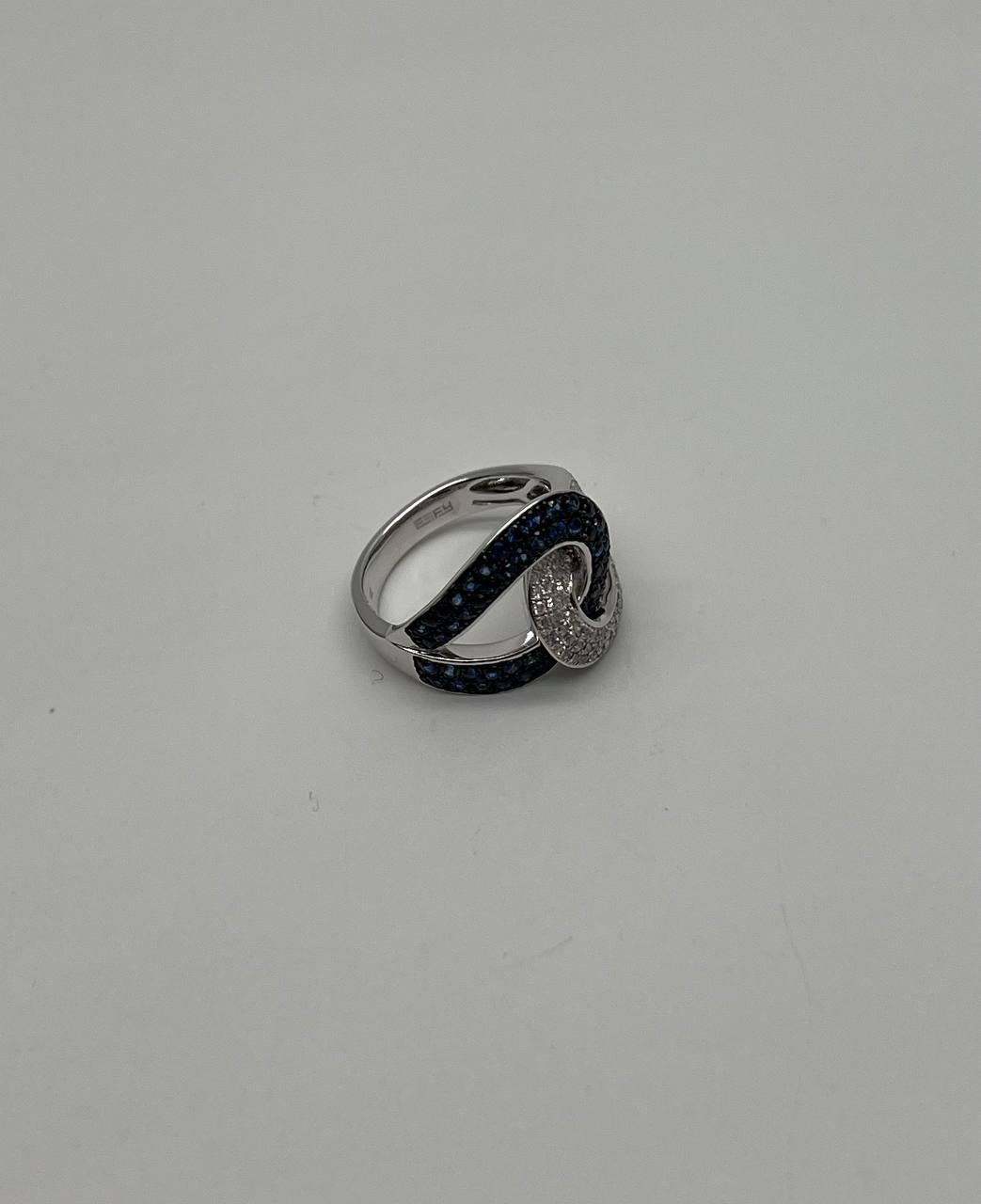 Intertwining Blue Sapphires Diamonds Interlocking Shapes White Gold Fashion Ring