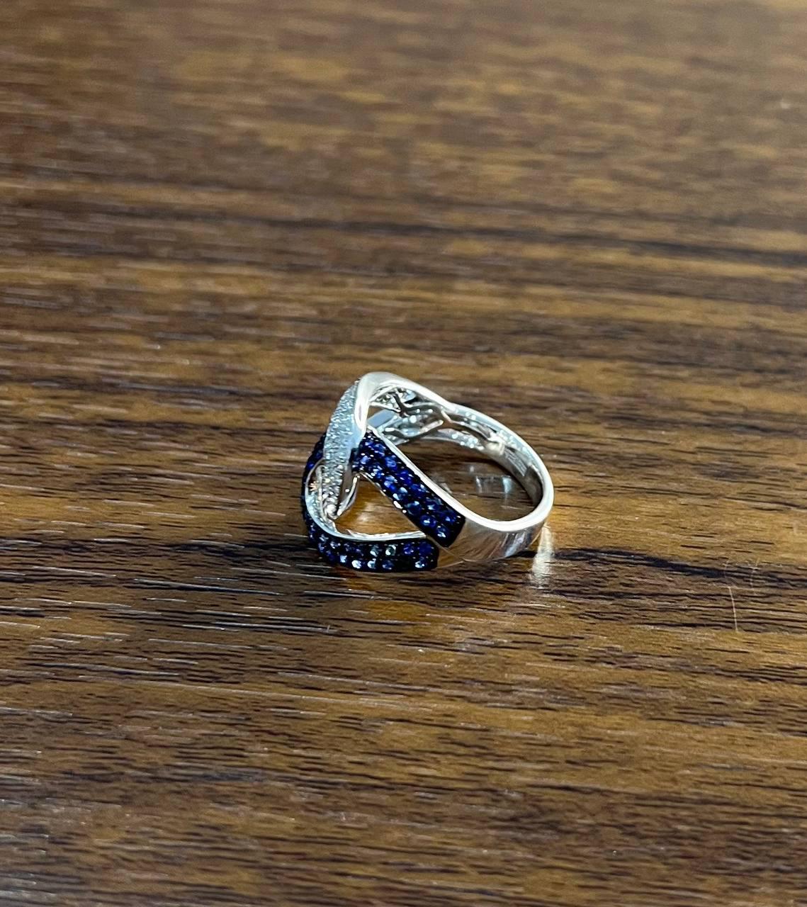 Intertwining Blue Sapphires Diamonds Interlocking Shapes White Gold Fashion Ring