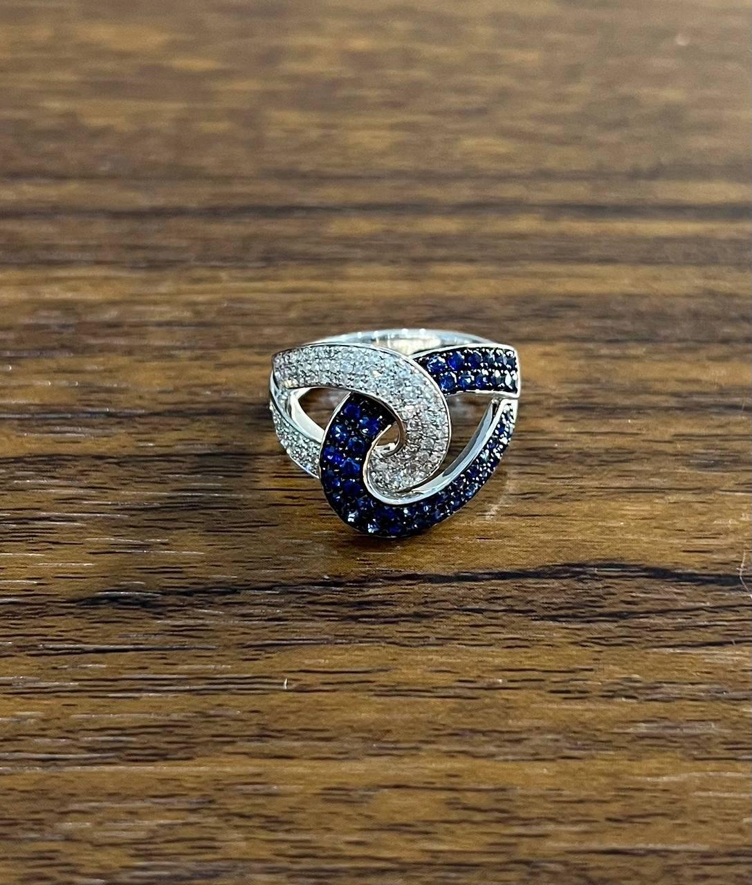 Intertwining Blue Sapphires Diamonds Interlocking Shapes White Gold Fashion Ring