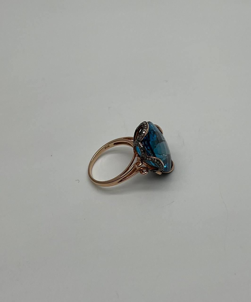 Oval Shape Swiss Blue Topaz 14K Rose Gold Champagne Halo Cocktail Ring