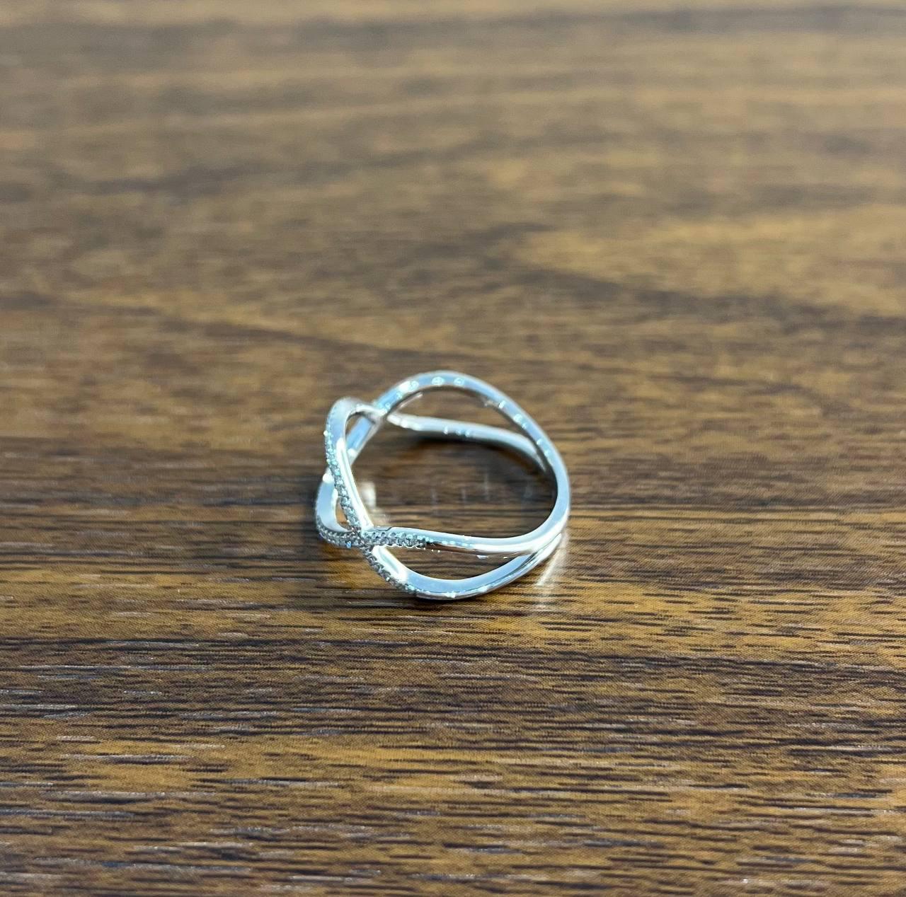 Geometric Infinity Twist Brilliant Cut White Diamond 18 Karat White Gold Ring