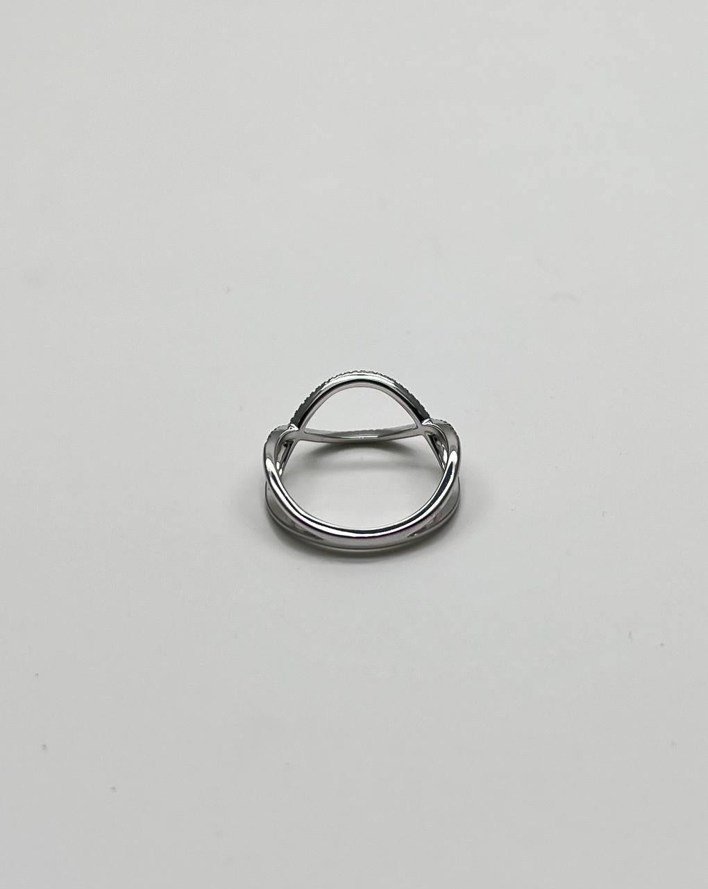 Geometric Infinity Twist Brilliant Cut White Diamond 18 Karat White Gold Ring