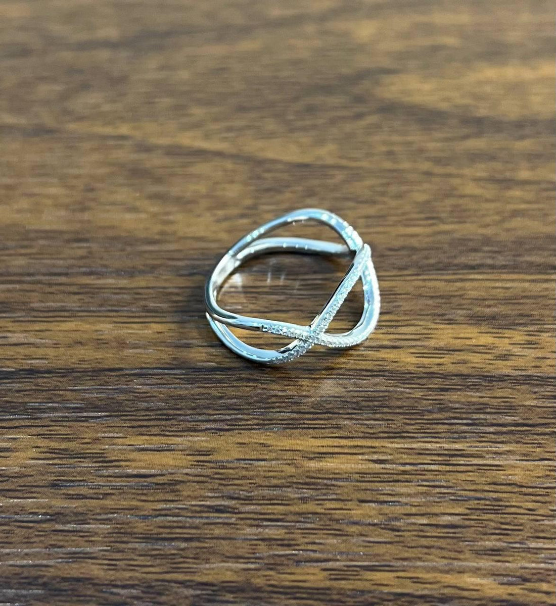 Geometric Infinity Twist Brilliant Cut White Diamond 18 Karat White Gold Ring