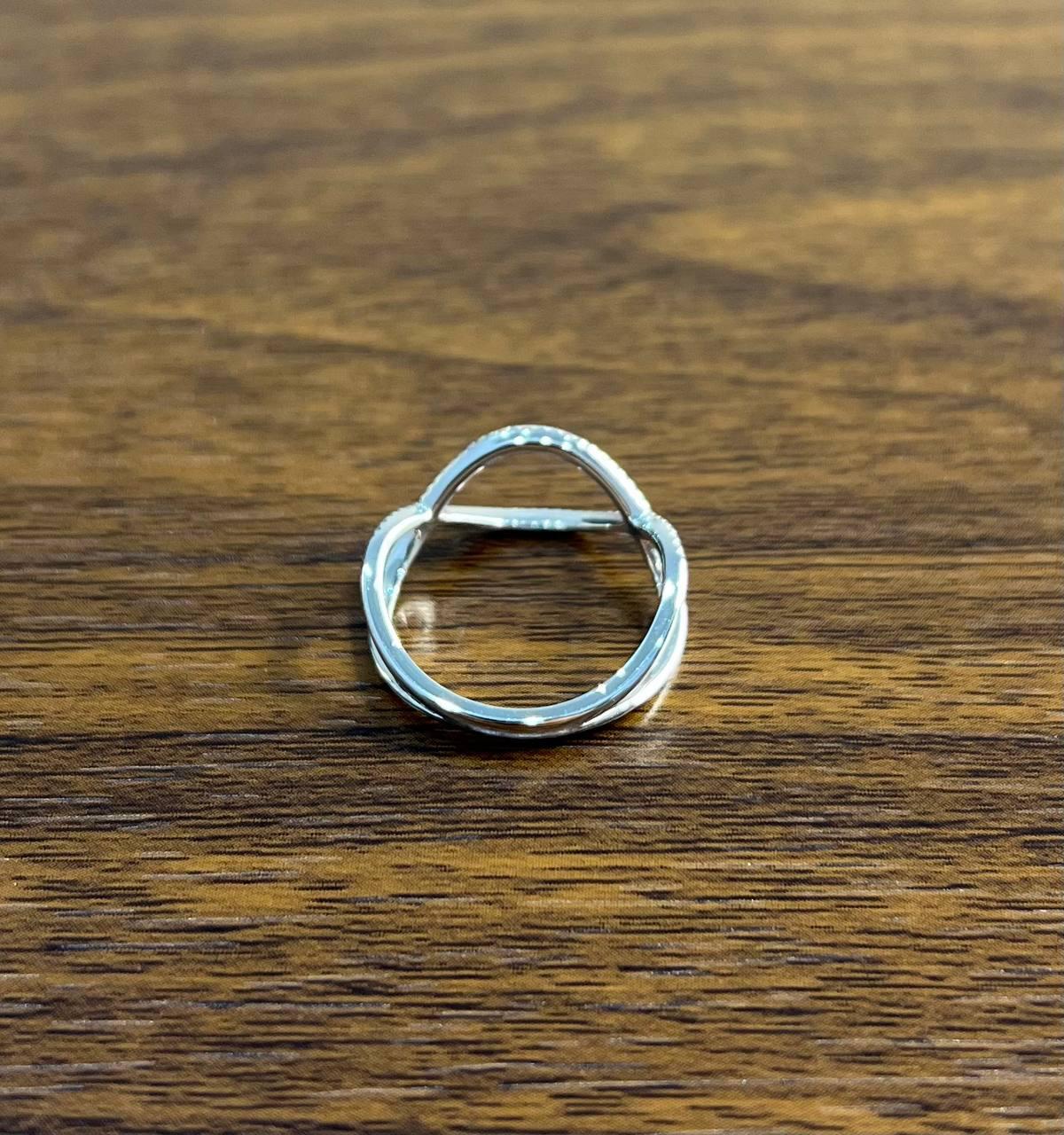 Geometric Infinity Twist Brilliant Cut White Diamond 18 Karat White Gold Ring