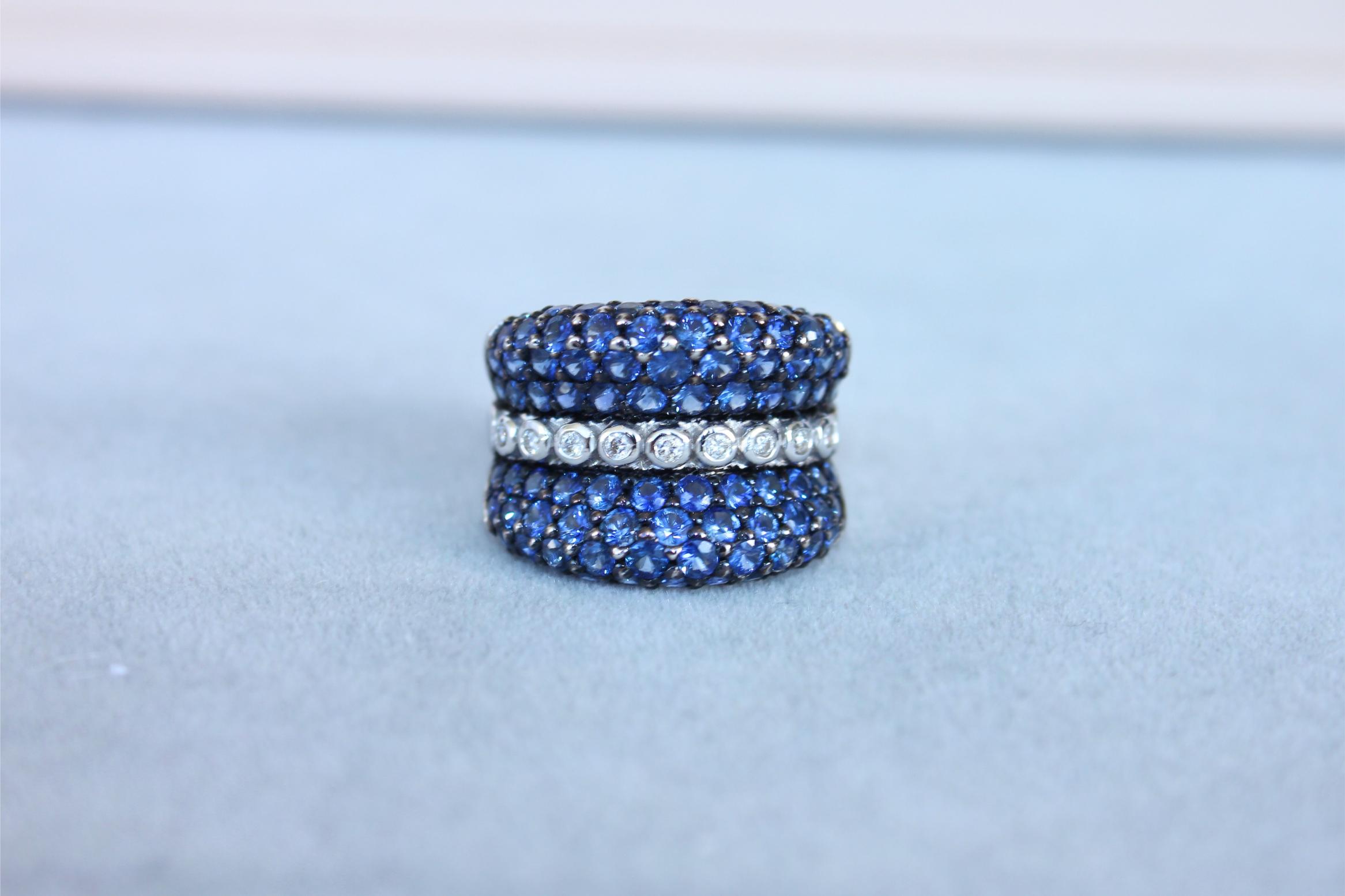 Round Diamond Bezel Set Blue Sapphire Pave Set 18 Karat White Gold Unique Ring