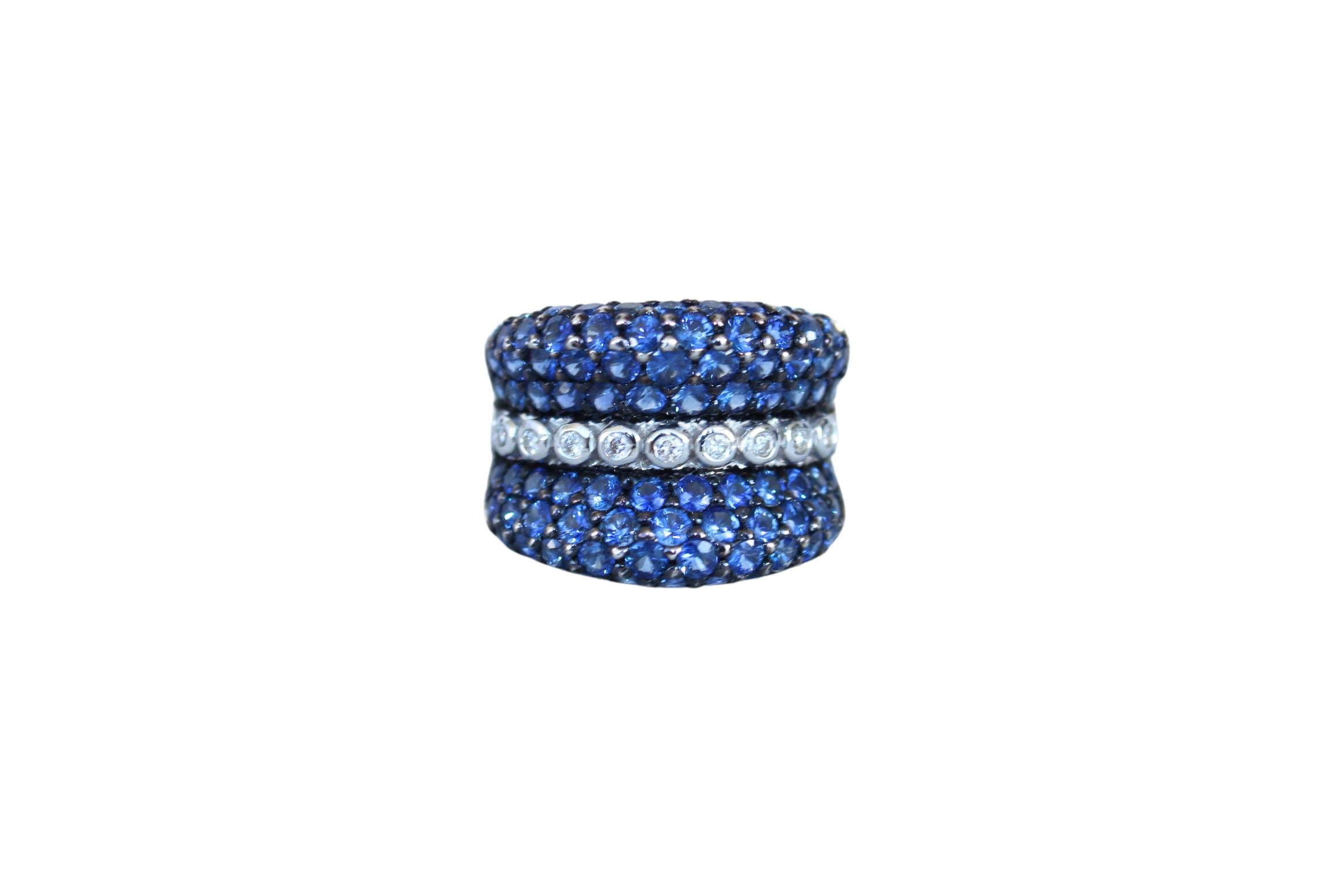 Round Diamond Bezel Set Blue Sapphire Pave Set 18 Karat White Gold Unique Ring