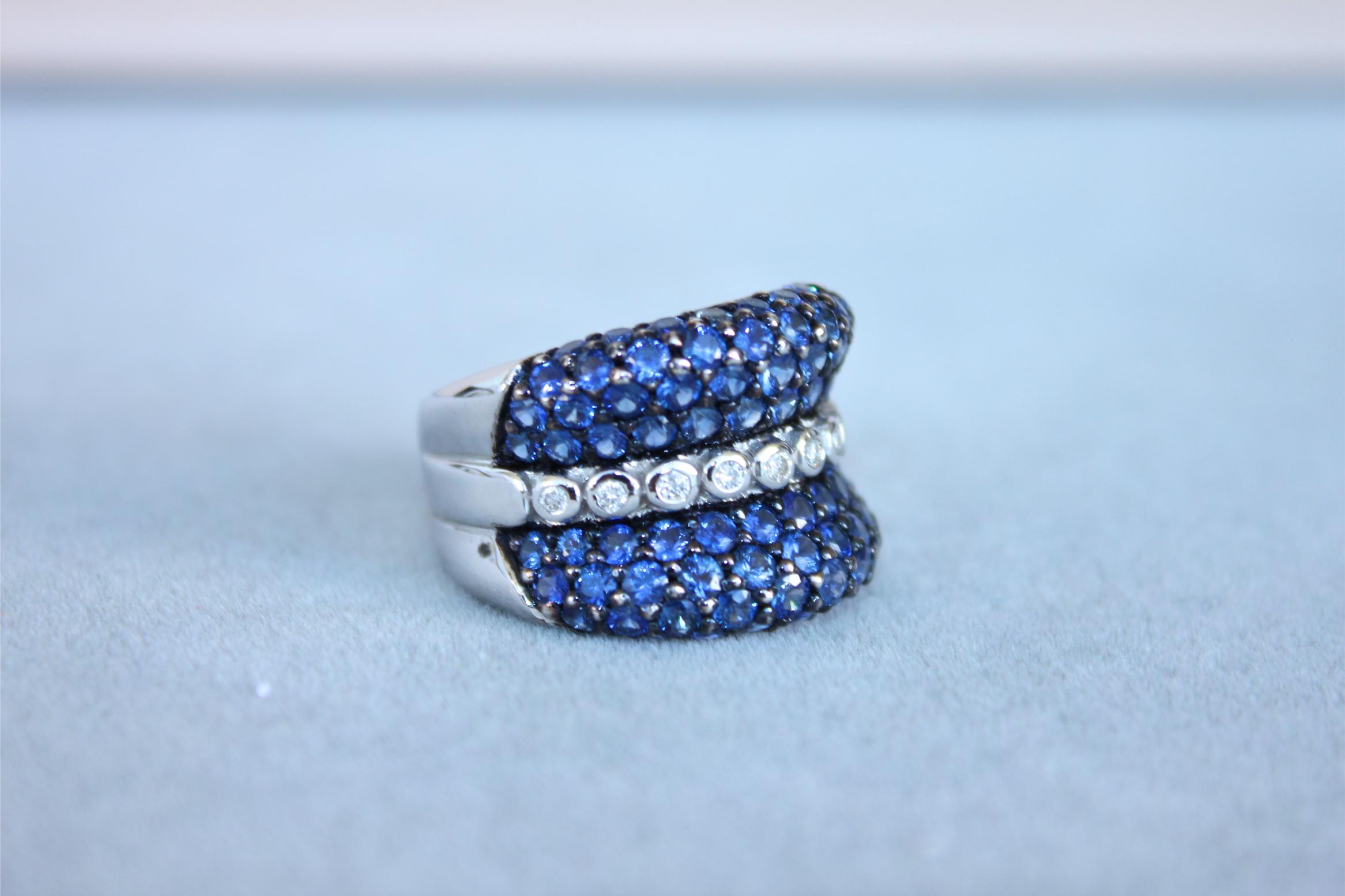 Round Diamond Bezel Set Blue Sapphire Pave Set 18 Karat White Gold Unique Ring
