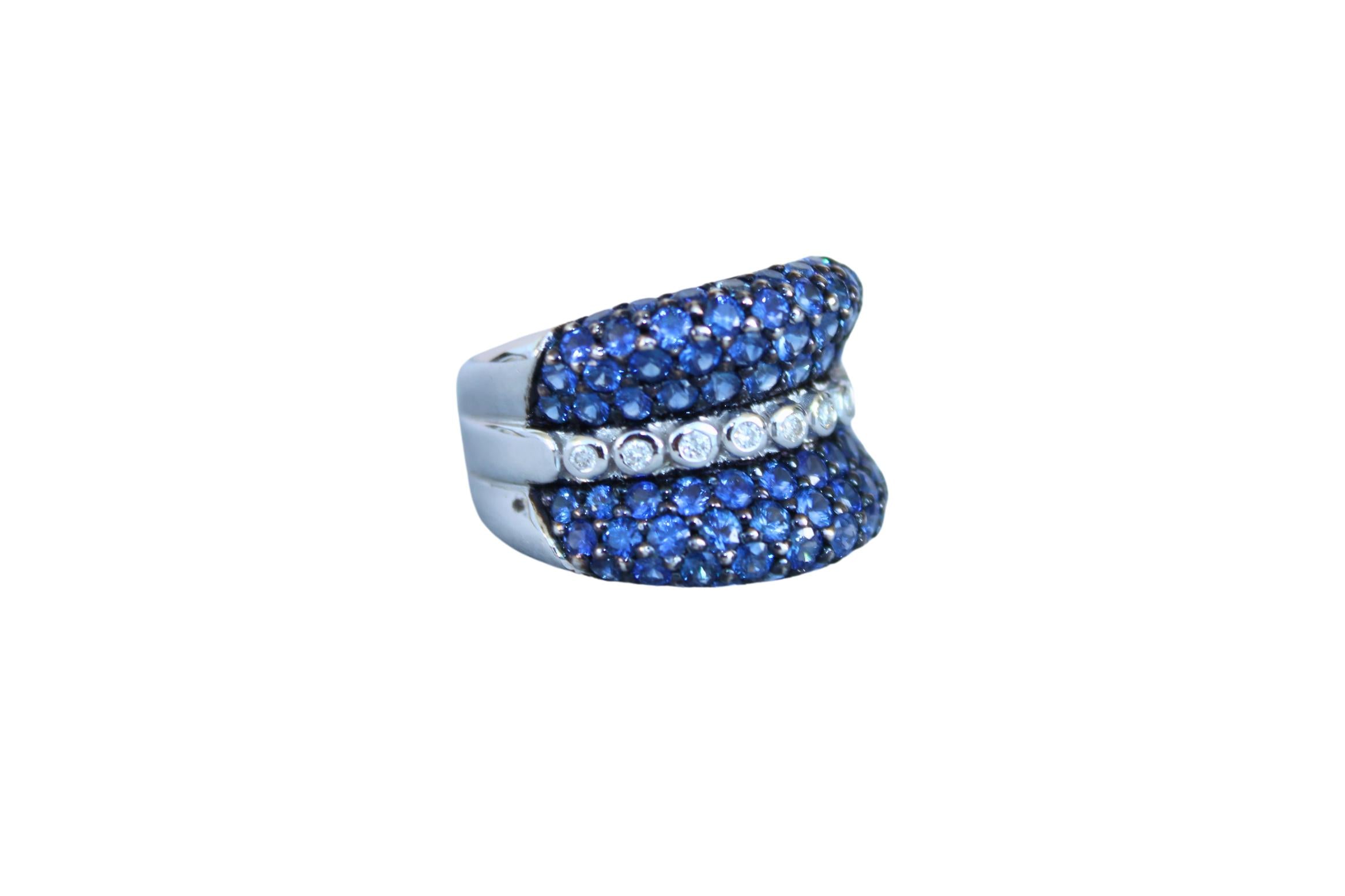 Round Diamond Bezel Set Blue Sapphire Pave Set 18 Karat White Gold Unique Ring