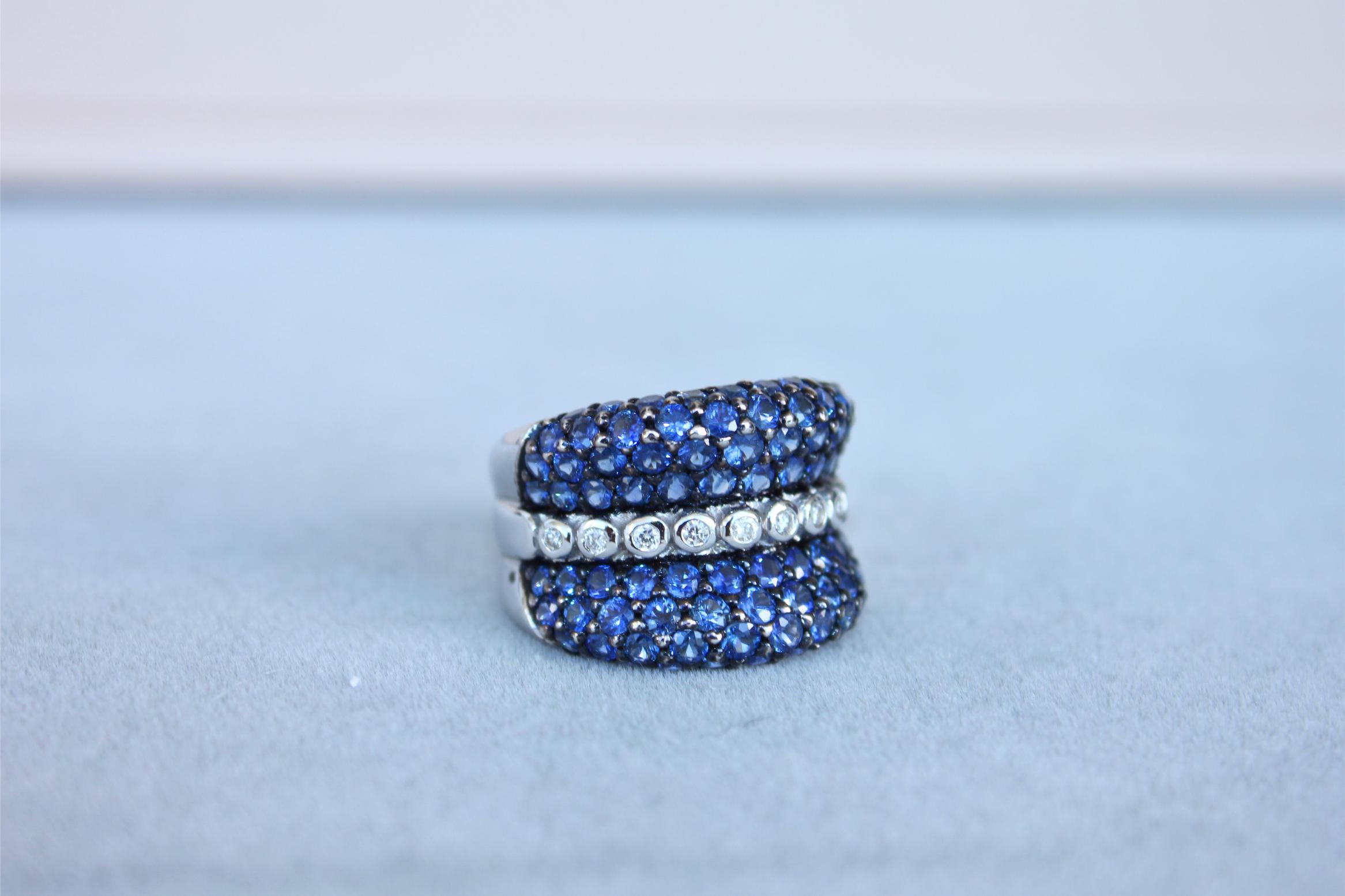 Round Diamond Bezel Set Blue Sapphire Pave Set 18 Karat White Gold Unique Ring