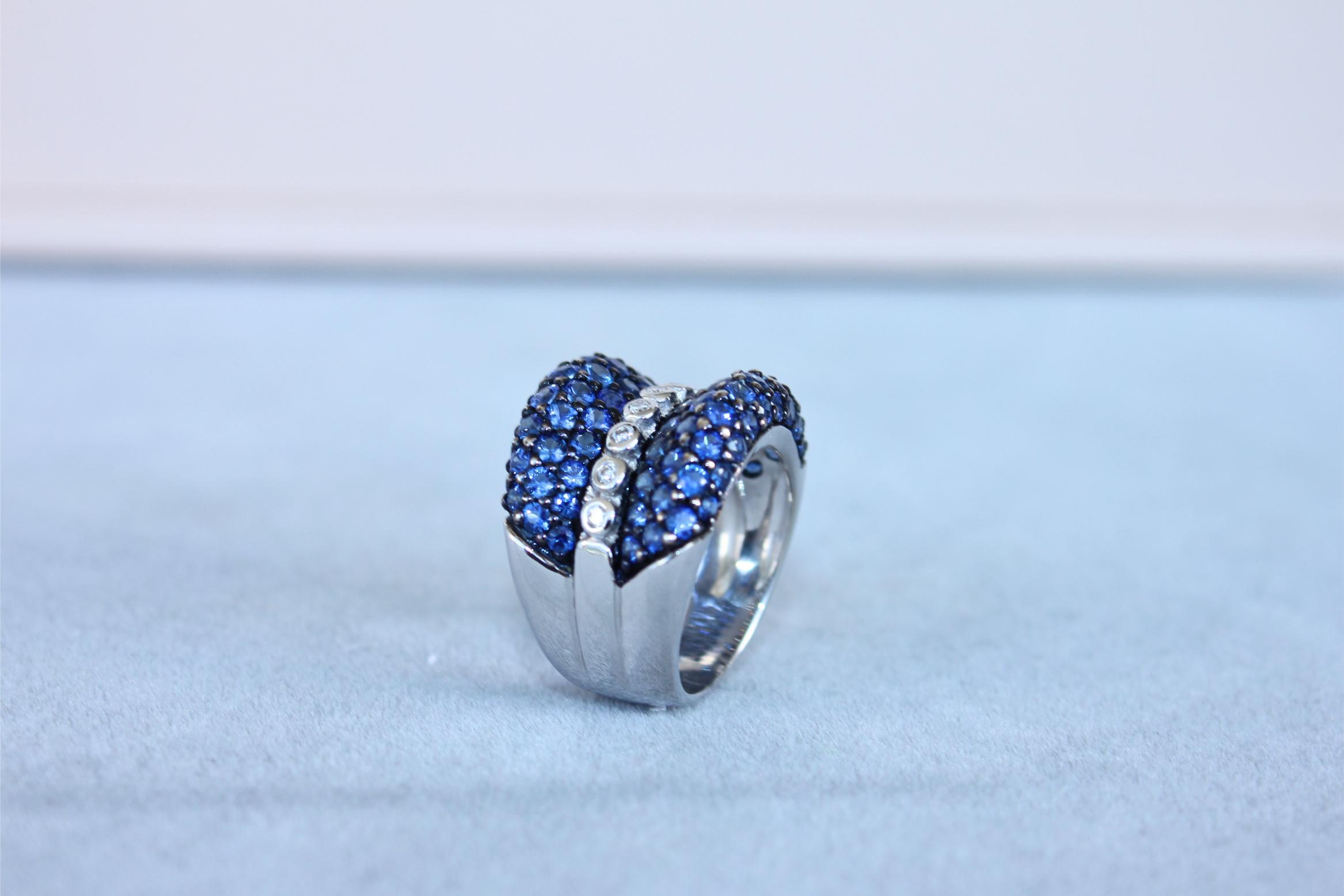 Round Diamond Bezel Set Blue Sapphire Pave Set 18 Karat White Gold Unique Ring