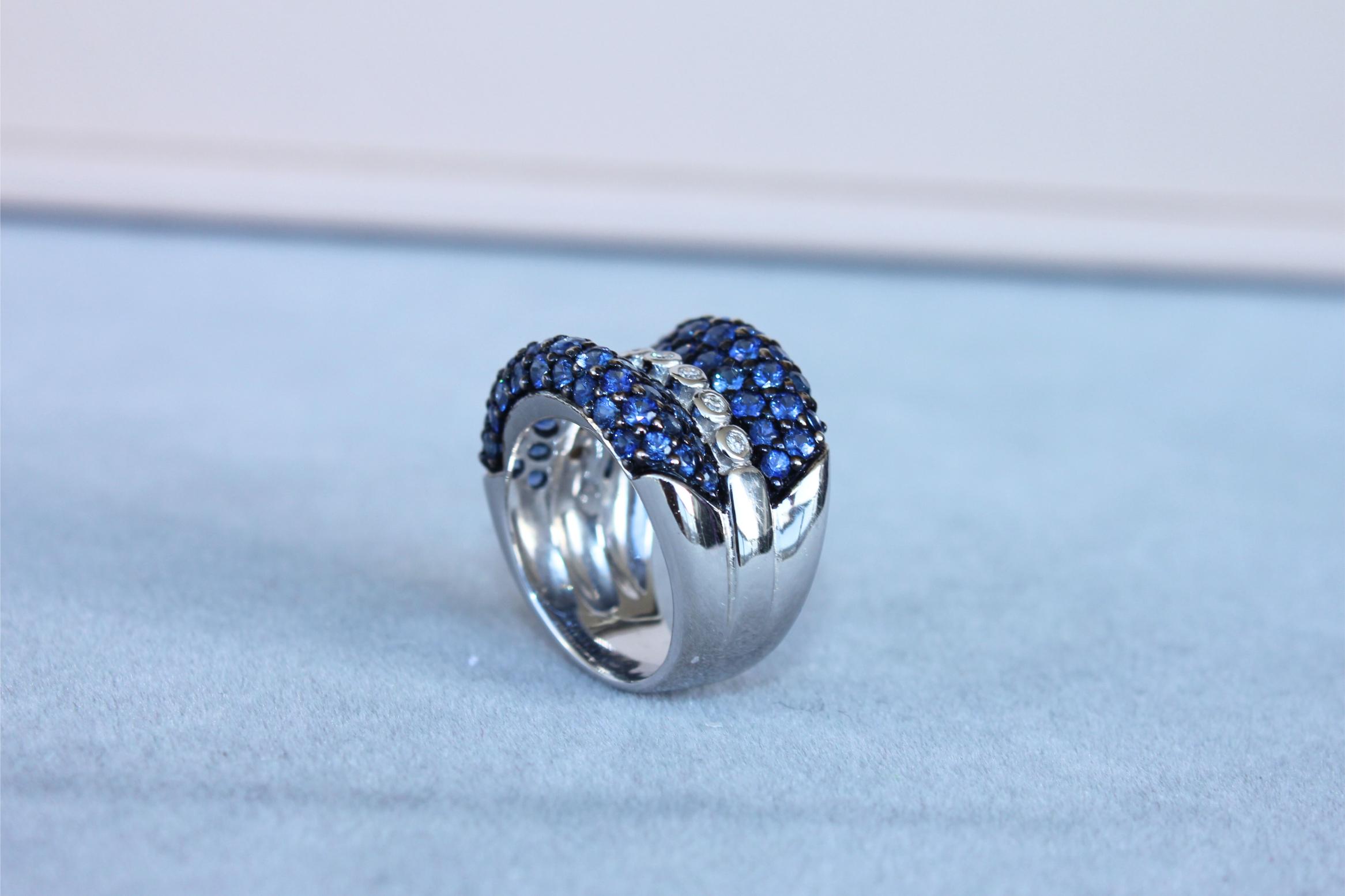 Round Diamond Bezel Set Blue Sapphire Pave Set 18 Karat White Gold Unique Ring
