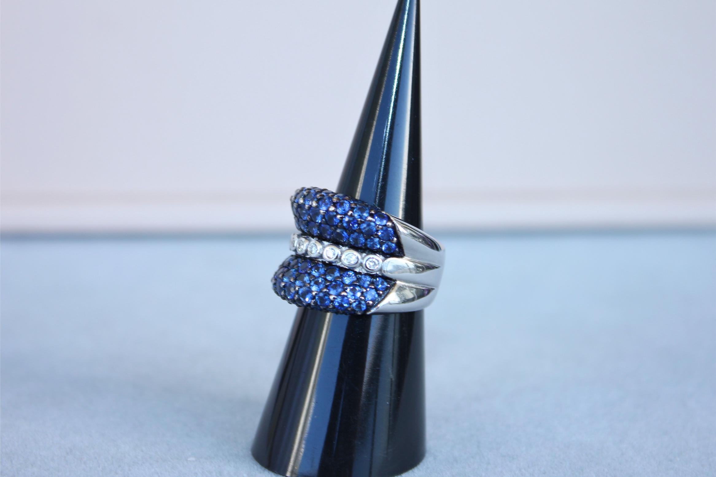 Round Diamond Bezel Set Blue Sapphire Pave Set 18 Karat White Gold Unique Ring