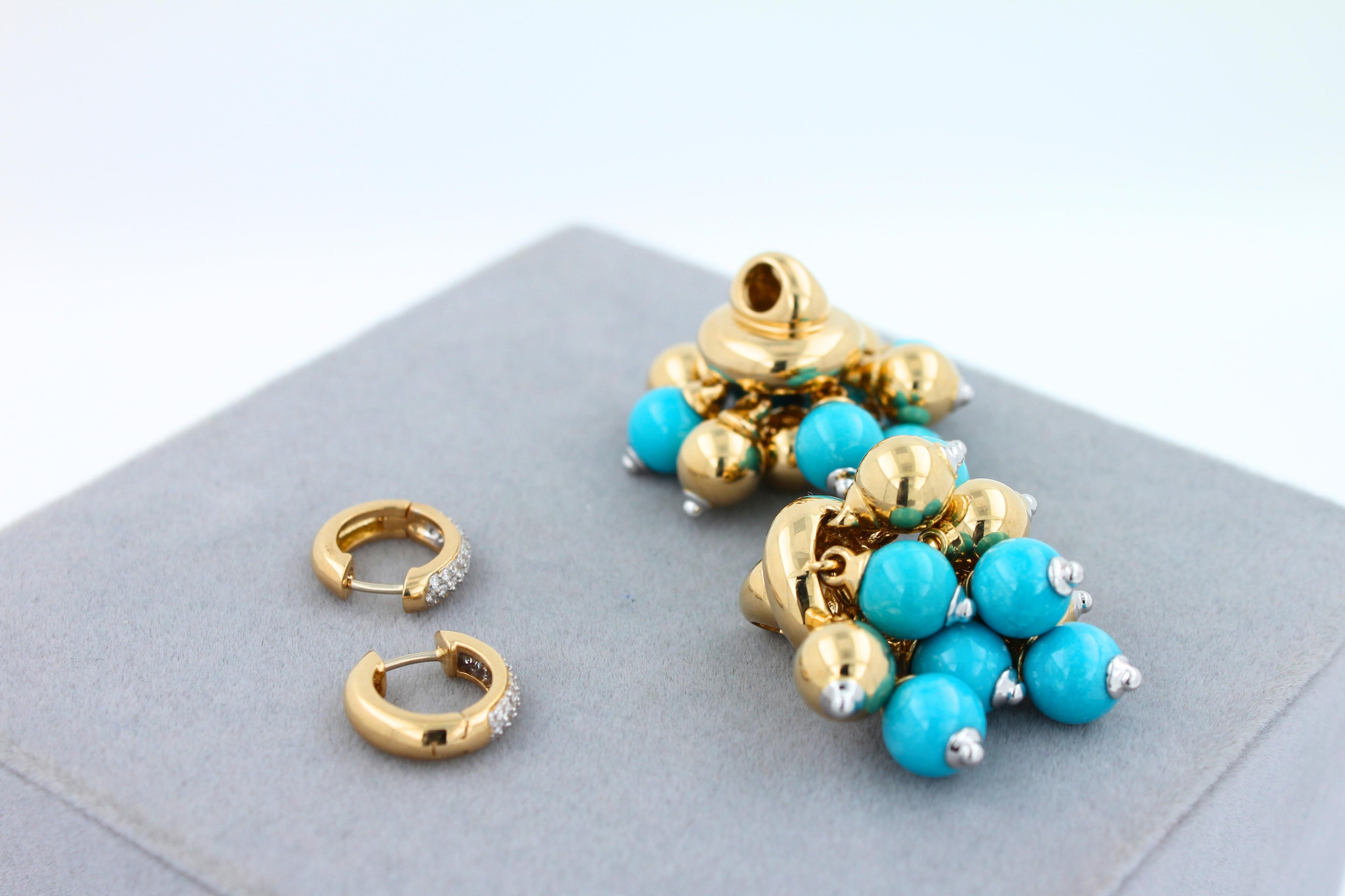 Blue Turquoise Diamonds Golden Sphere Bells Motif Two Tone Gold Huggie Earrings