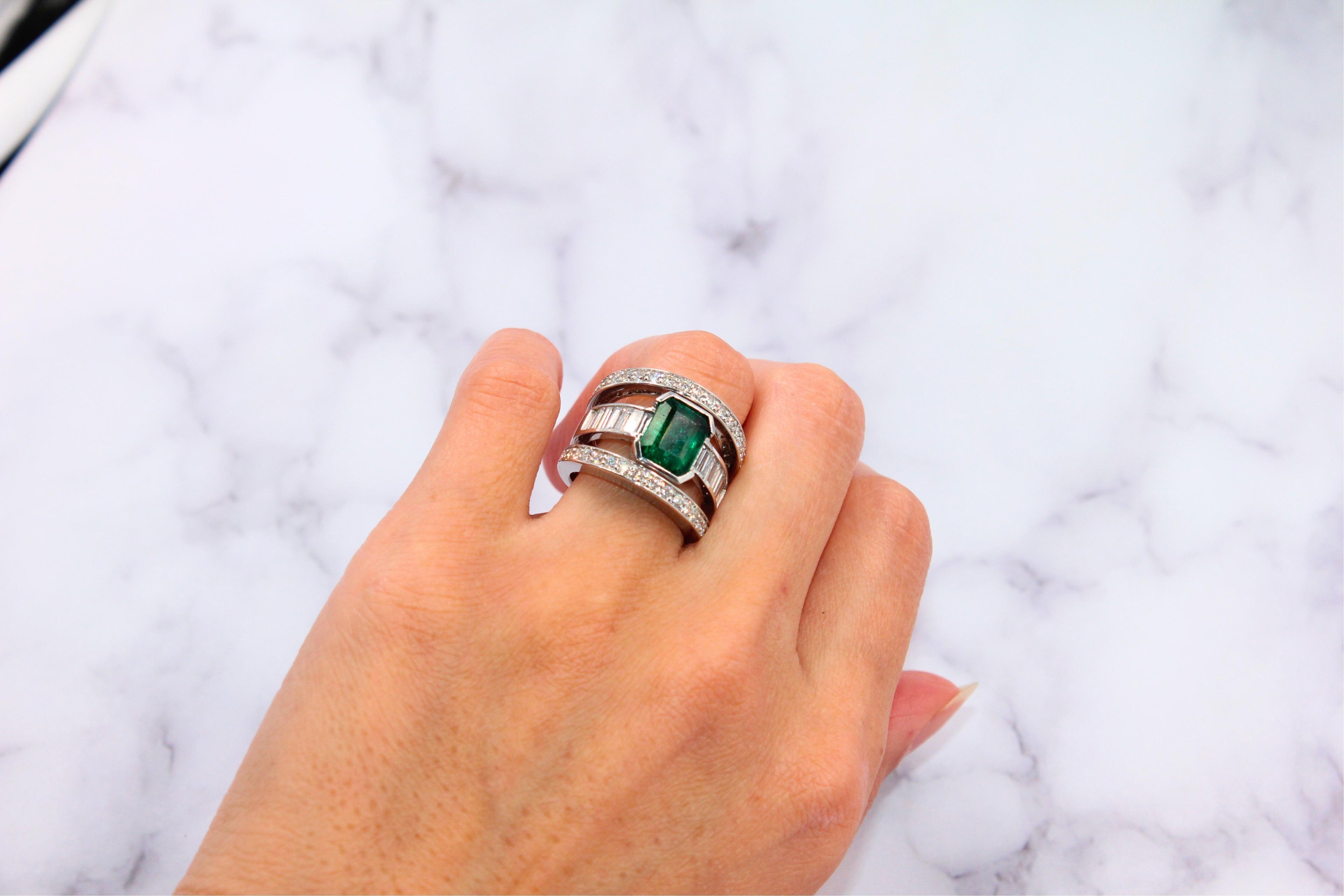 Zambian Emerald 18 Karat White Gold Full Finger Bezel Diamond Baguette Rows Ring