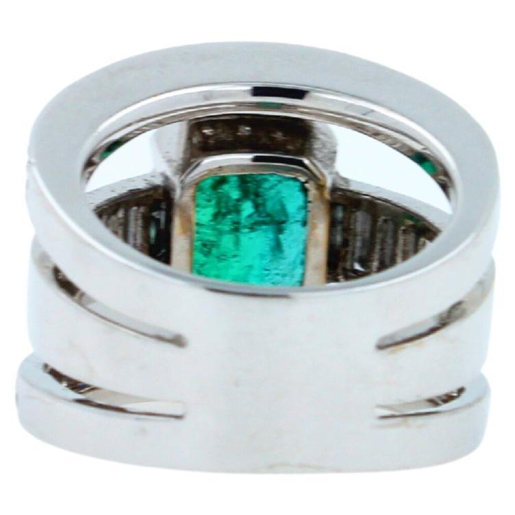 Zambian Emerald 18 Karat White Gold Full Finger Bezel Diamond Baguette Rows Ring