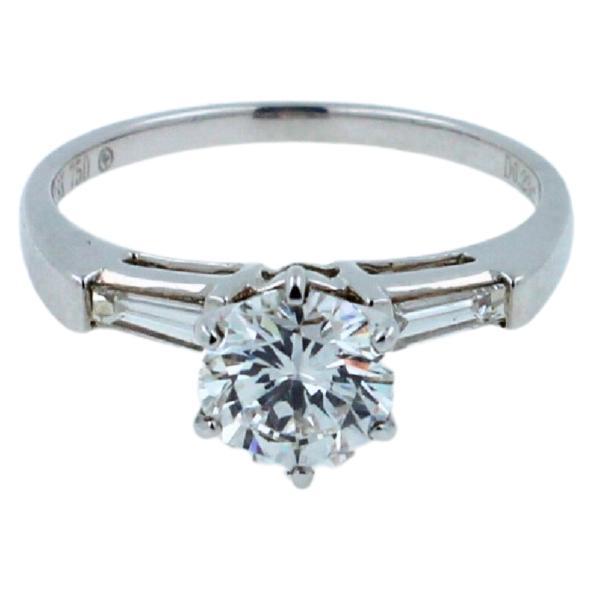1.00 carat round shape brilliant cut diamond 18k white gold baguette sides ring