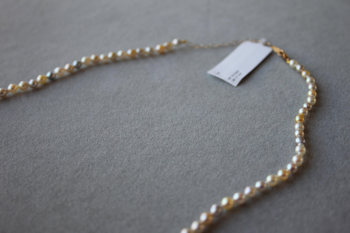 14 karat yellow gold multicolor akoya cultured pearl layer thin bead necklace
