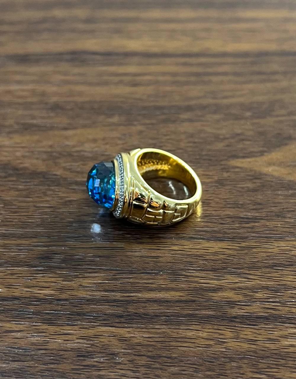 Large Oval Shape Swiss Blue Topaz 14K Horizontal Yellow Gold Dome Cocktail Ring