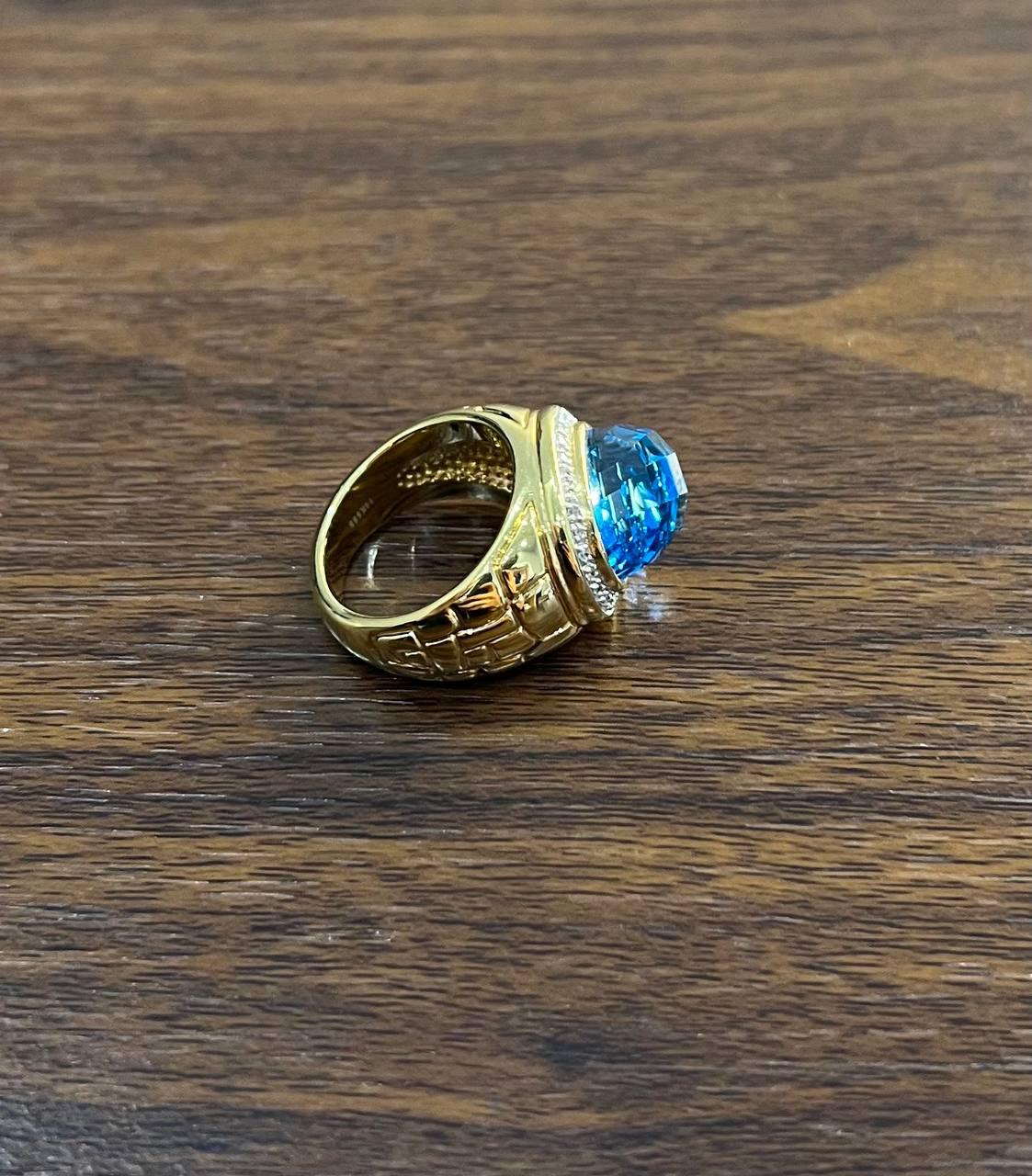 Large Oval Shape Swiss Blue Topaz 14K Horizontal Yellow Gold Dome Cocktail Ring