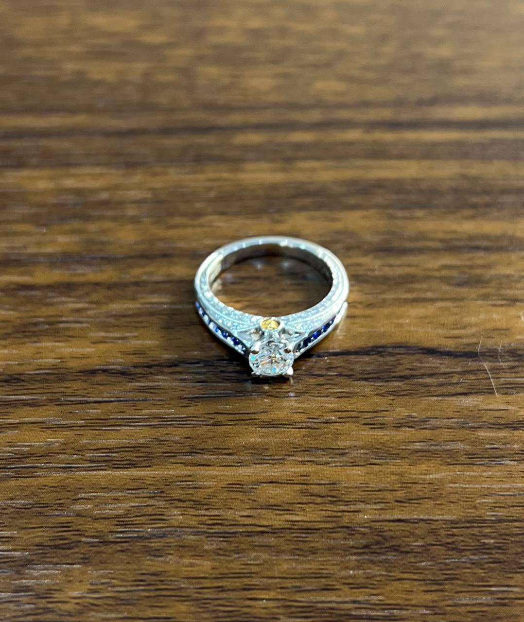 round shape brilliant cut diamond blue sapphire channel set 18k white gold ring