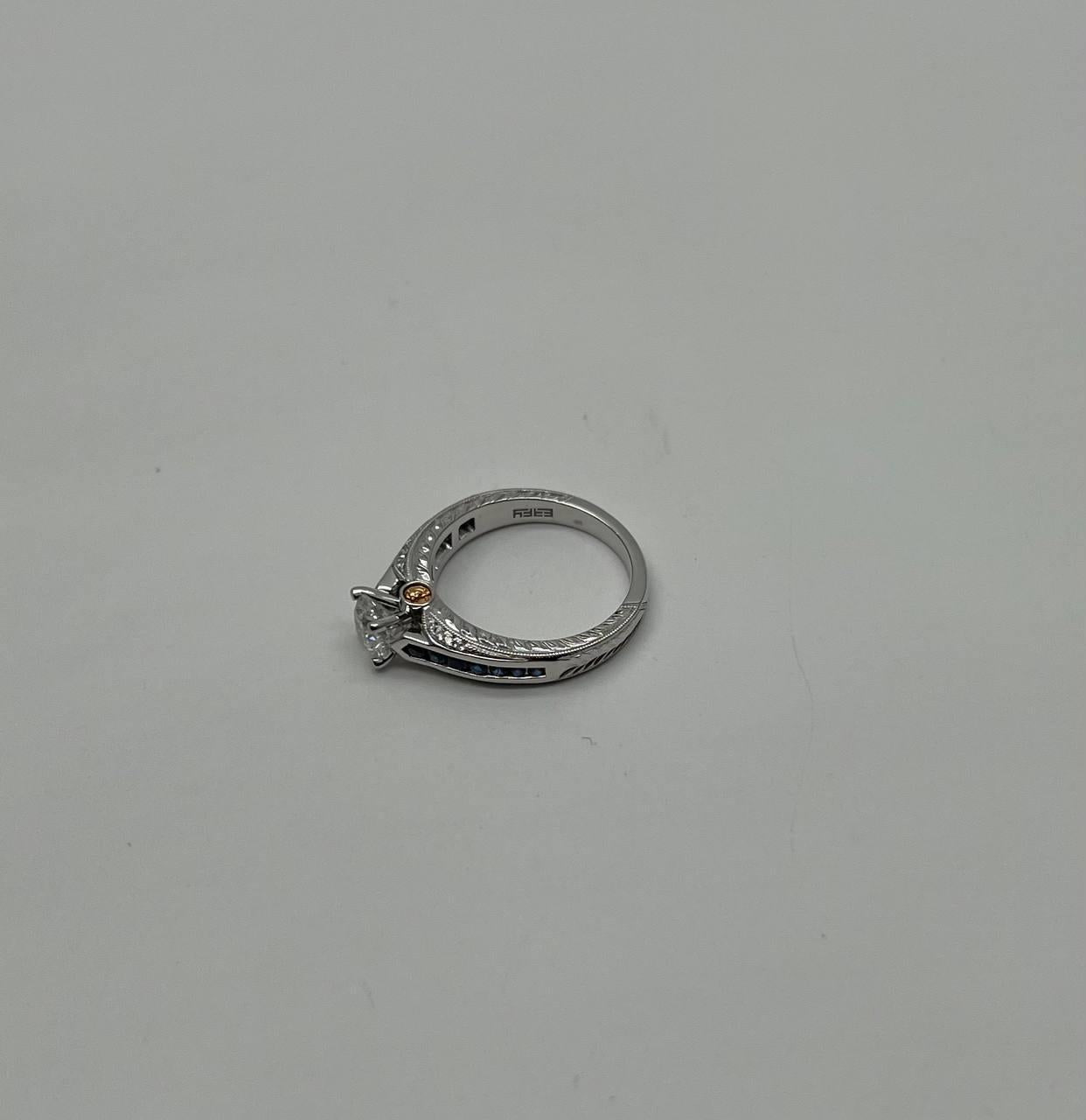 round shape brilliant cut diamond blue sapphire channel set 18k white gold ring