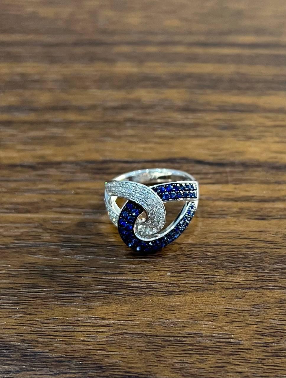 Intertwining Blue Sapphires Diamonds Interlocking Shapes White Gold Fashion Ring