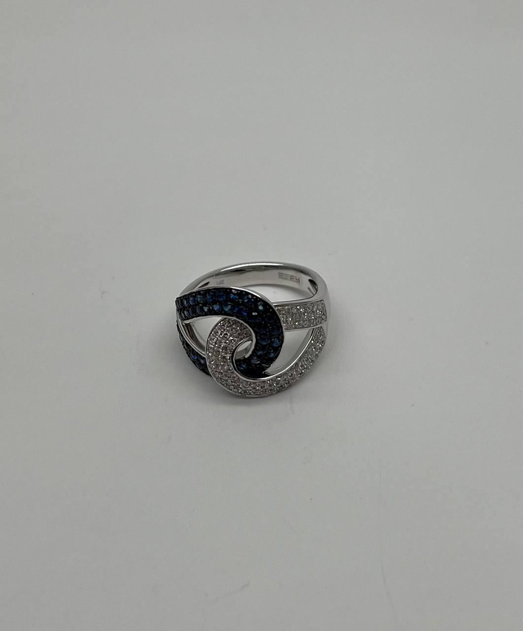 Intertwining Blue Sapphires Diamonds Interlocking Shapes White Gold Fashion Ring