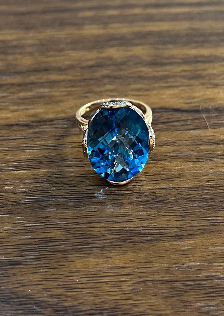 Oval Shape Swiss Blue Topaz 14K Rose Gold Champagne Halo Cocktail Ring