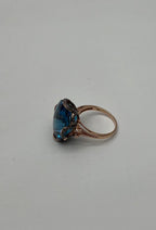 Oval Shape Swiss Blue Topaz 14K Rose Gold Champagne Halo Cocktail Ring