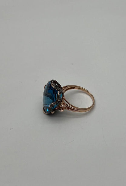 Oval Shape Swiss Blue Topaz 14K Rose Gold Champagne Halo Cocktail Ring