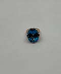 Oval Shape Swiss Blue Topaz 14K Rose Gold Champagne Halo Cocktail Ring