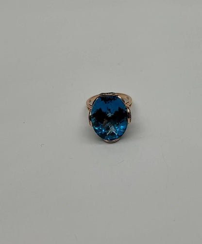 Oval Shape Swiss Blue Topaz 14K Rose Gold Champagne Halo Cocktail Ring