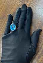 Oval Shape Swiss Blue Topaz 14K Rose Gold Champagne Halo Cocktail Ring