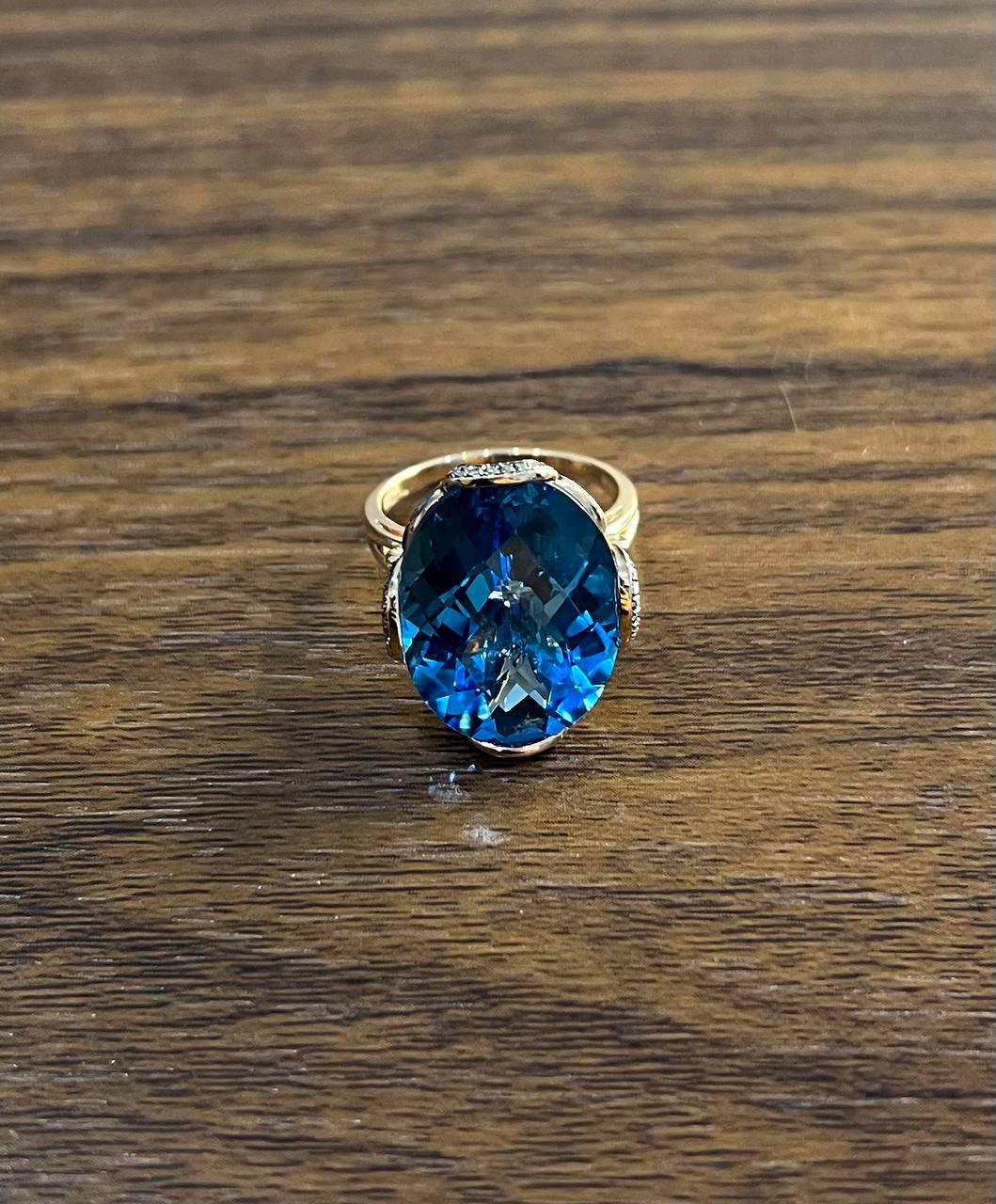 Oval Shape Swiss Blue Topaz 14K Rose Gold Champagne Halo Cocktail Ring