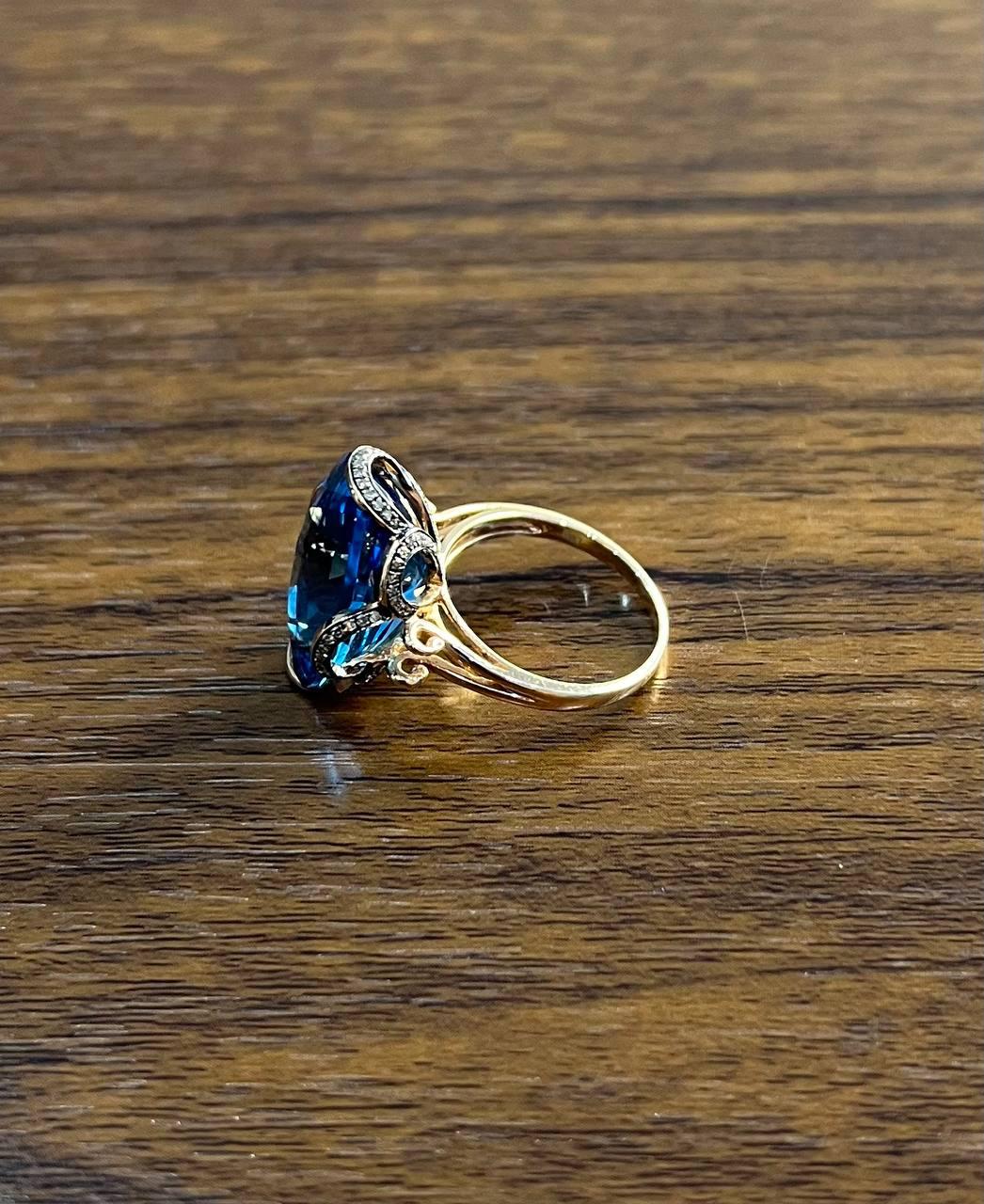 Oval Shape Swiss Blue Topaz 14K Rose Gold Champagne Halo Cocktail Ring