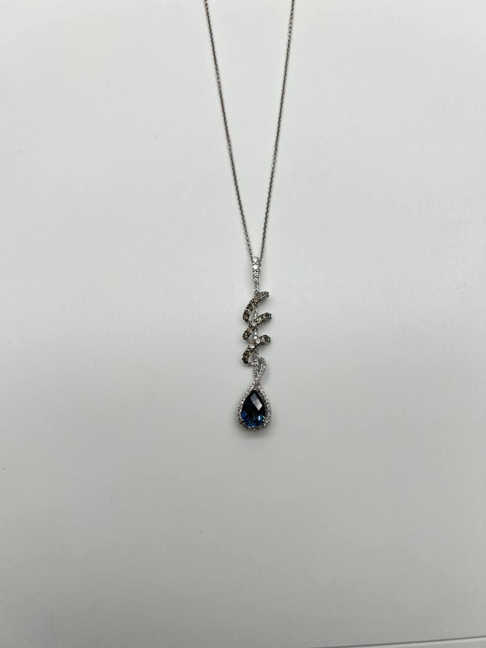 small blue sapphire pear drop diamond halo spiral white gold pendant necklace