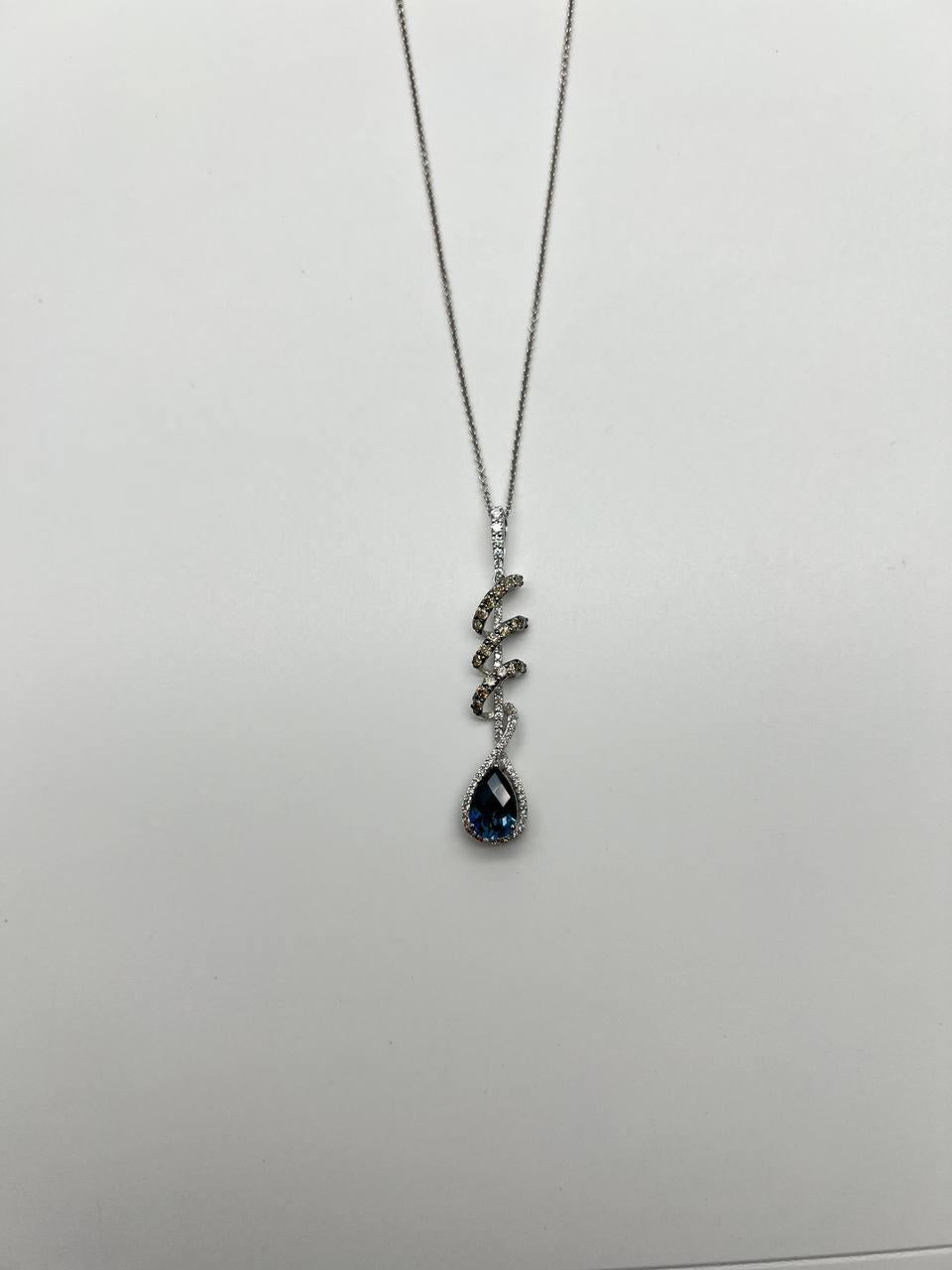 small blue sapphire pear drop diamond halo spiral white gold pendant necklace