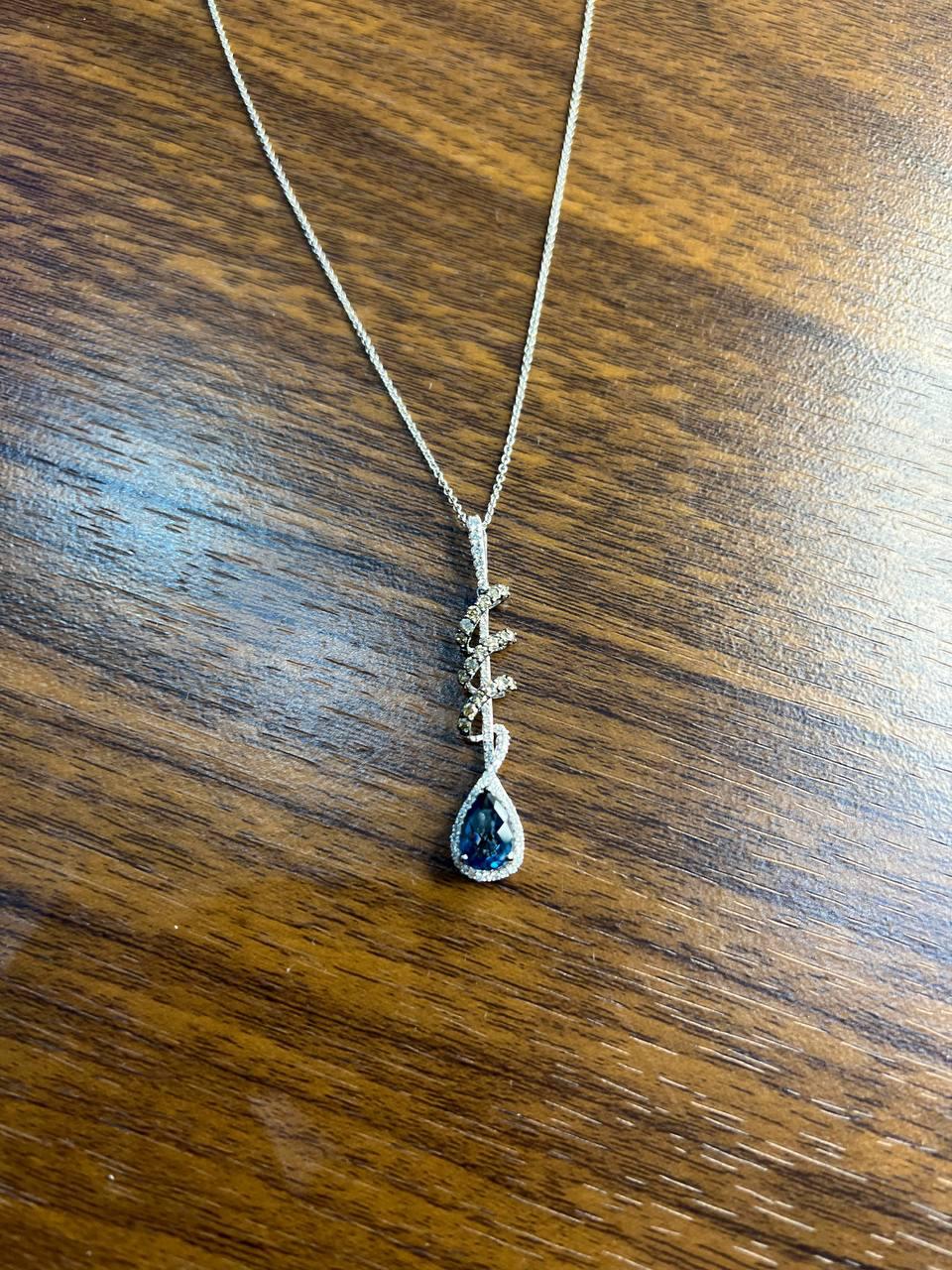 small blue sapphire pear drop diamond halo spiral white gold pendant necklace