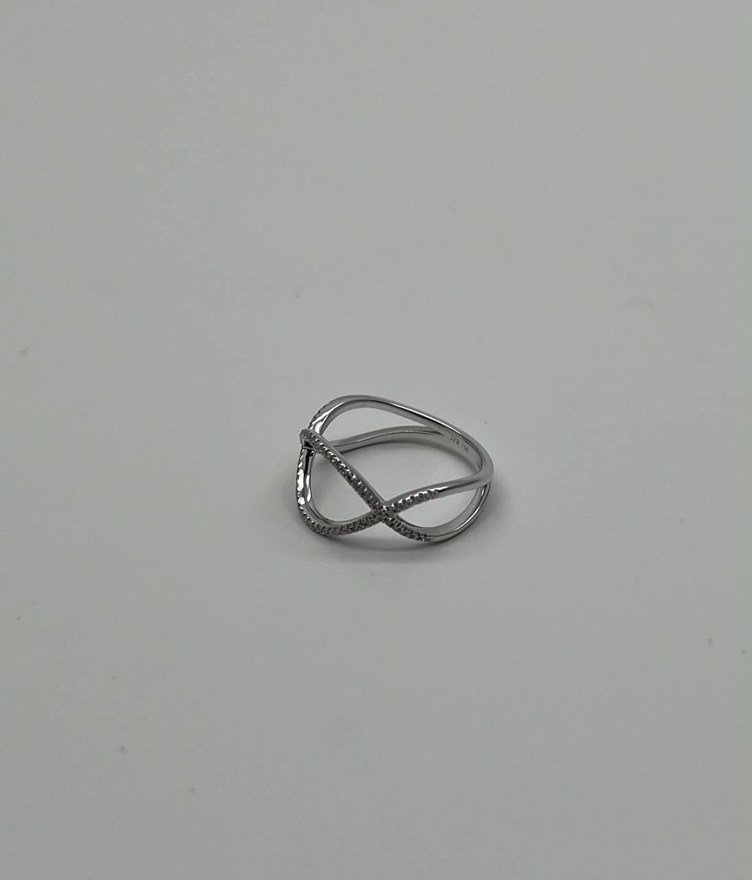 Geometric Infinity Twist Brilliant Cut White Diamond 18 Karat White Gold Ring