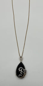 Black Onyx Cabochon Diamond 18 Karat Yellow Gold Floral Swirl Necklace Pendant
