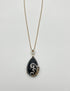 Black Onyx Cabochon Diamond 18 Karat Yellow Gold Floral Swirl Necklace Pendant