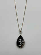 Black Onyx Cabochon Diamond 18 Karat Yellow Gold Floral Swirl Necklace Pendant