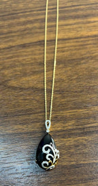 Black Onyx Cabochon Diamond 18 Karat Yellow Gold Floral Swirl Necklace Pendant