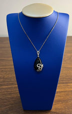 Black Onyx Cabochon Diamond 18 Karat Yellow Gold Floral Swirl Necklace Pendant