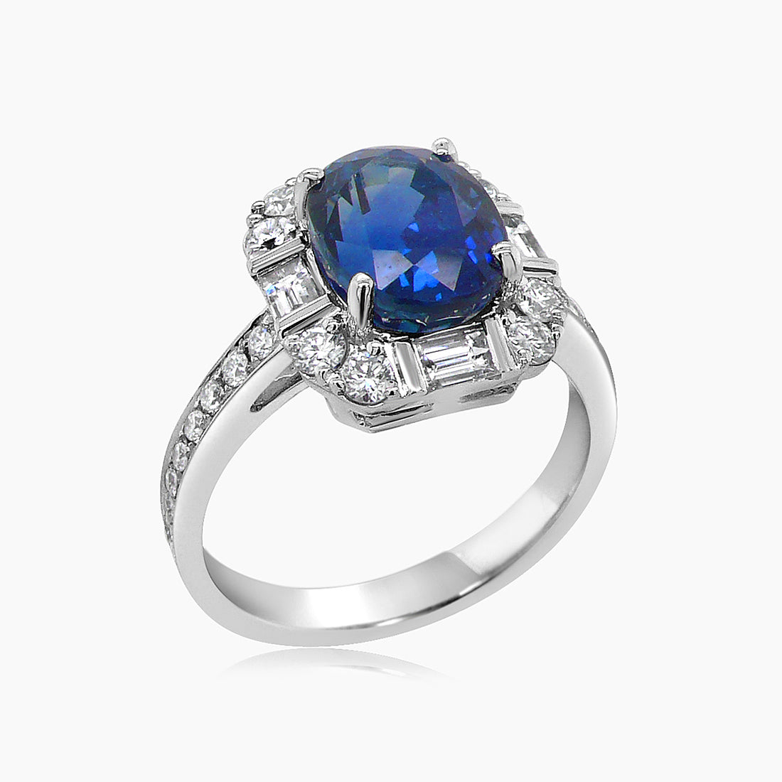 Oval Shape Blue Sapphire & Baguette White Diamond 18K White Gold Halo Ring
