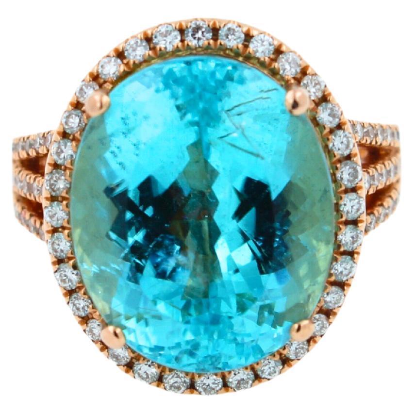 blue paraiba tourmaline diamond halo classic simple solitaire 18 karat gold ring