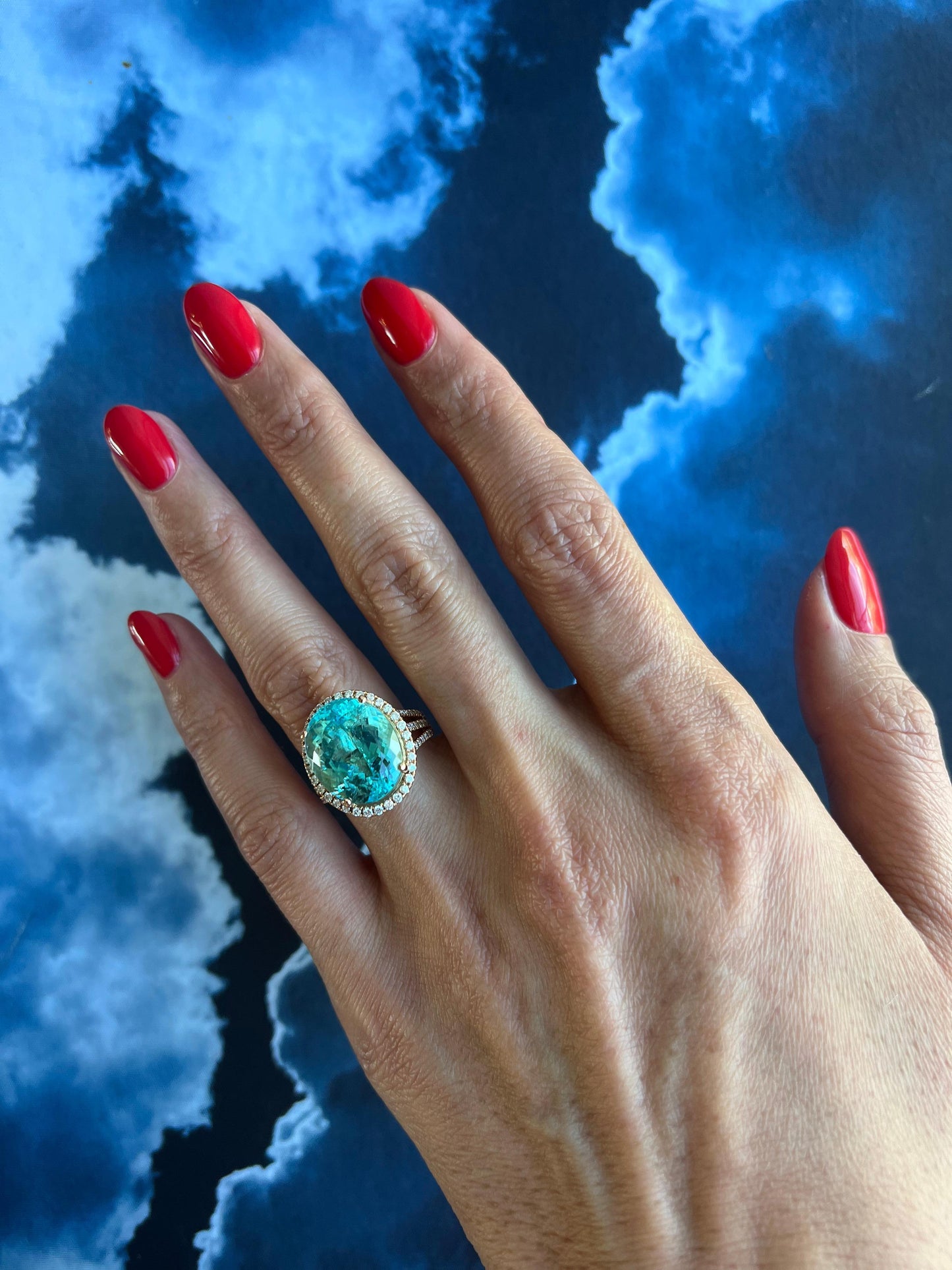 blue paraiba tourmaline diamond halo classic simple solitaire 18 karat gold ring