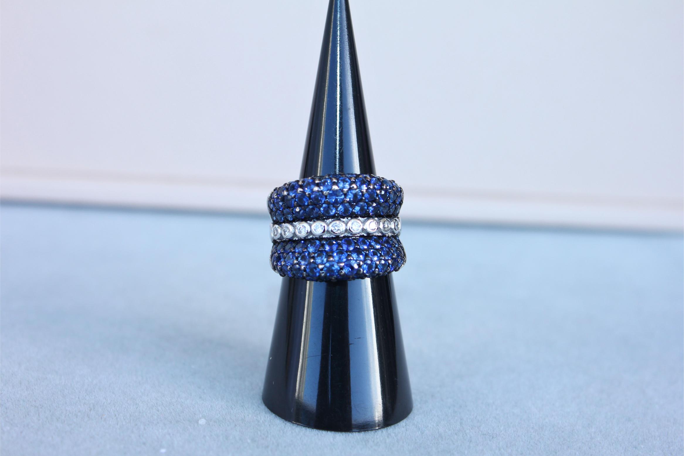 Round Diamond Bezel Set Blue Sapphire Pave Set 18 Karat White Gold Unique Ring